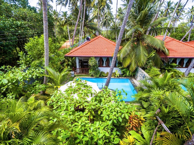 Ville con piscina in hotel tropicale