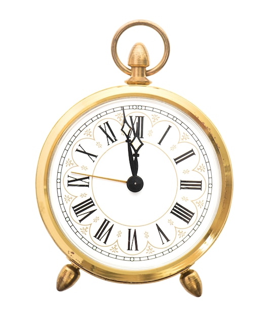 Vintage alarm clock isolated on white background. Five to twelve