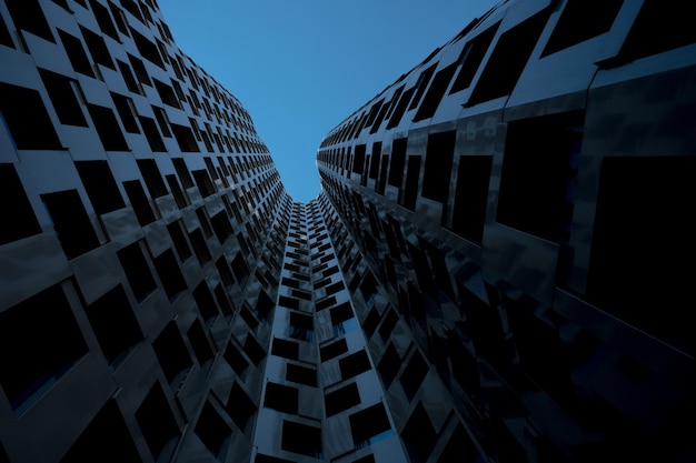 Vista a basso angolo di edifici moderni contro un cielo limpido al crepuscolo