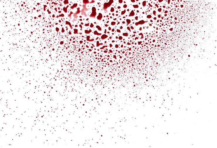 Foto vista ad alto angolo di macchie di vernice rossa su sfondo bianco