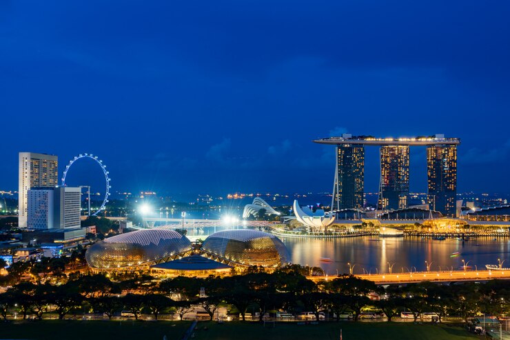 Foto vista aerea del distretto aziendale e della città di singapore alla notte a singapore, asia.