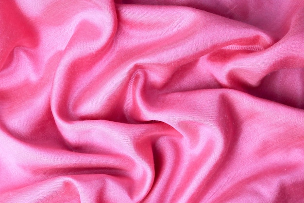 Vista dall'alto sfondo texture tessile dai toni rosa astratto