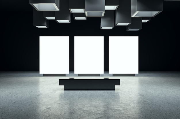 Vista frontale su tre schermi digitali bianchi vuoti con spazio per la pubblicità o la campagna nell'interno astratto della sala espositiva scura con pavimento in cemento su sfondo mockup di rendering 3D