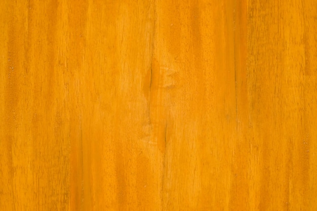 Vista ravvicinata del bordo di legno di colore arancione minimalista per lo sfondo della trama