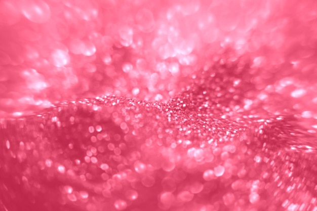 Viva Magenta illumina il fondo del bokeh. Luci natalizie bokeh. Colore dell'anno 2023.