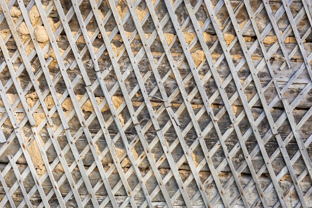 Wattle e daub struttura della parete dell'edificio e lo sfondo sotto la luce solare diretta durante il giorno