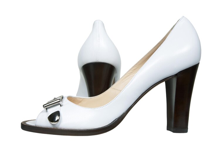 Photo white female shoes on a white background
