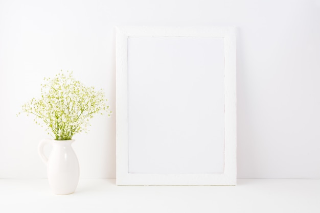 White frame with baby's breath flowers