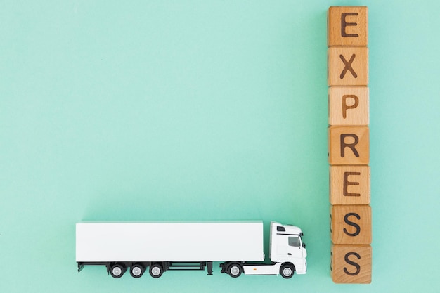 White truck with wooden box on turquoise background Express delivery