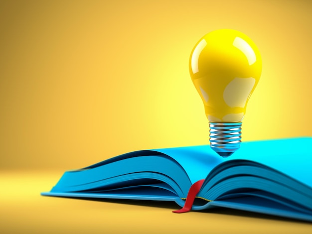 Yellow light bulb on the blue open book Idean and creativity concept background