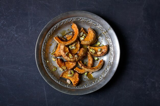 Zucca al forno con pistacchi e miele