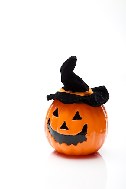 Zucca di Halloween con cappello nero