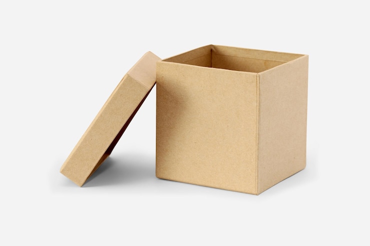 Fotografie a cardboard box with a hole in the top that says quot a quot on it