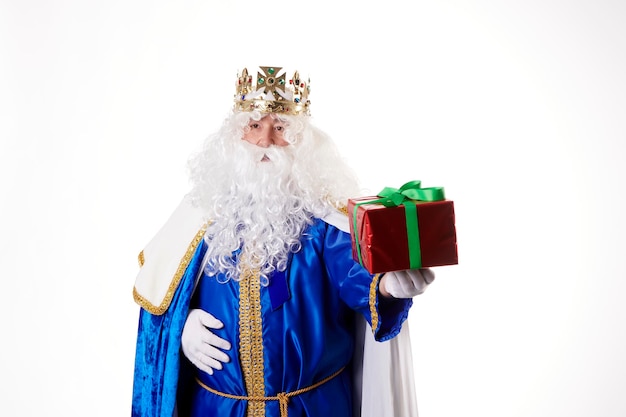 a magician with a present on a white background