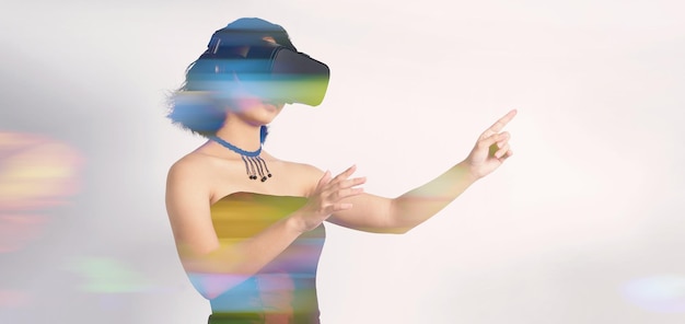 asian teenage woman wearing vr or virtual reality head set