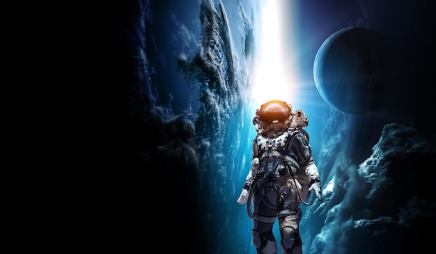 Astronaut walking on an unexplored planet. Mixed media