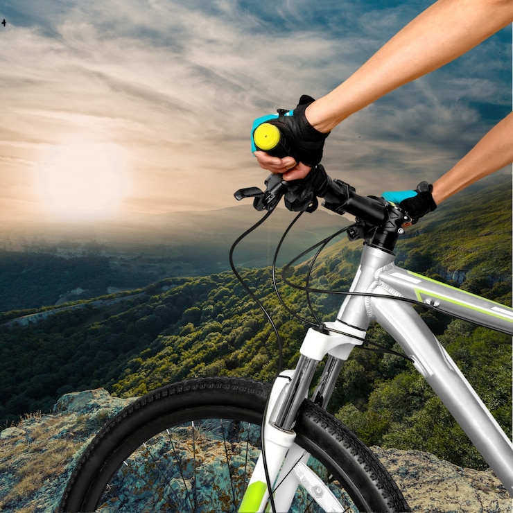 Fotografie attractive woman with bike  on background