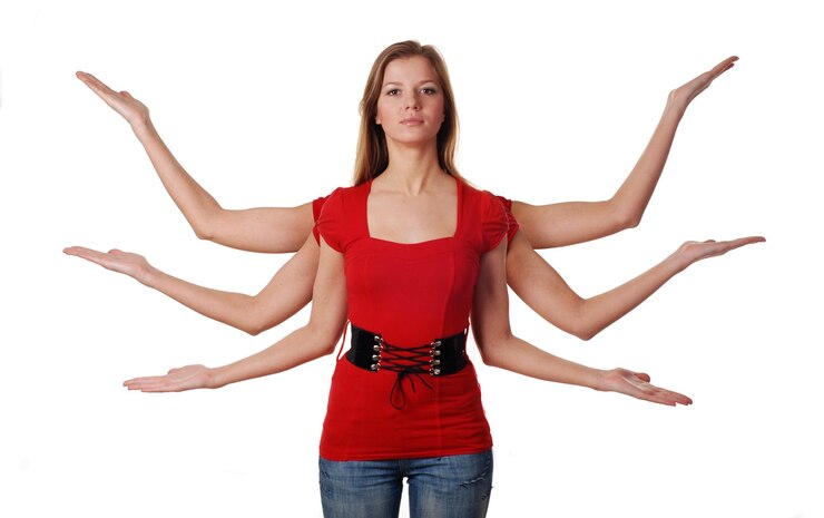 Fotografie beautiful young woman with six hands on white background