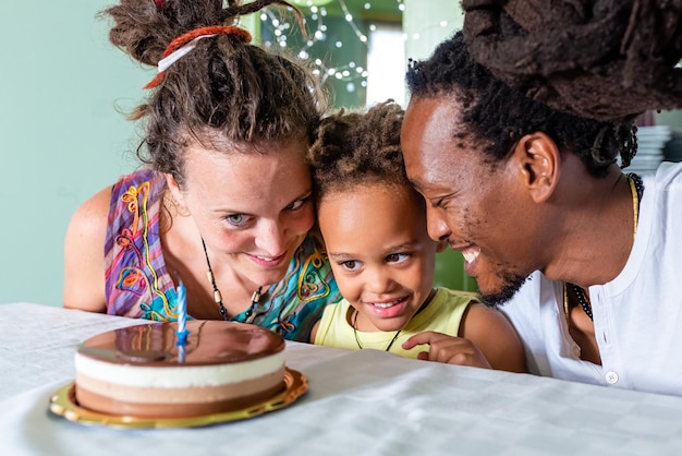 birthday party of a child in a multiethnic family rasta people celebrating a party concept of love and united family