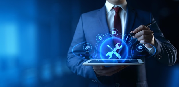 businessman holding tablet with technical support icons on screen customer service and support