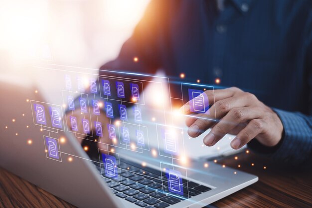 Businessman using software computer check data document on server for documents management concept