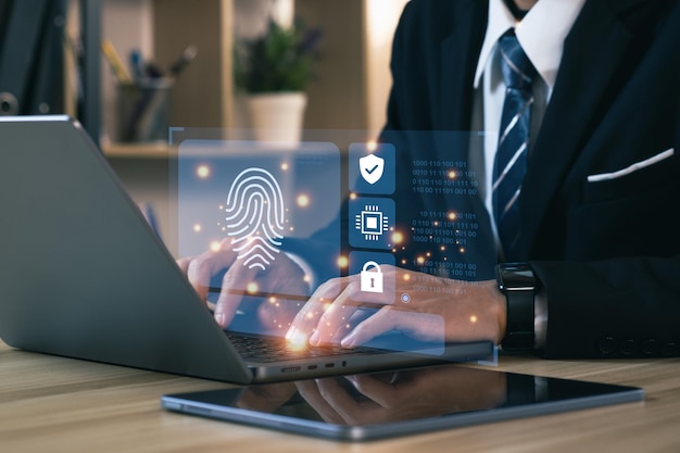 Businessmen using a computer to cyber security digital technology business people use fingerprints to access personal cybersecurity keeping users personal information safe Concept of surveillance