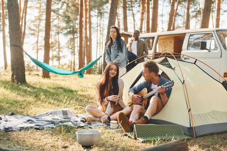 Fotografie camp and car group of young people is traveling together in the forest at daytime