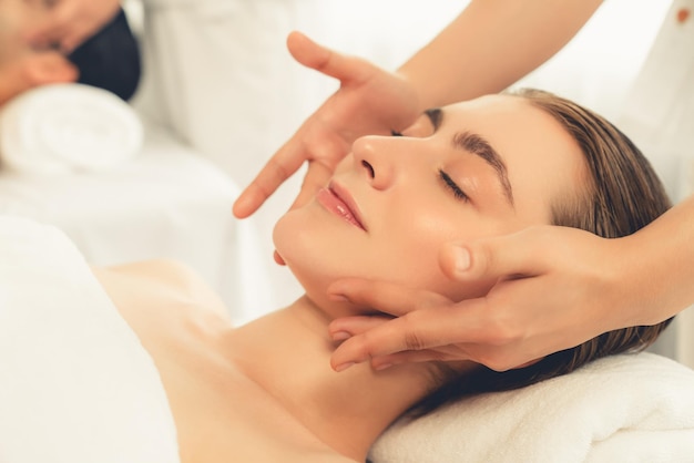 Caucasian couple enjoying relaxing antistress head massage Quiescent