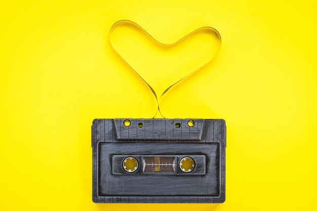 Close-up of heart shape against yellow background