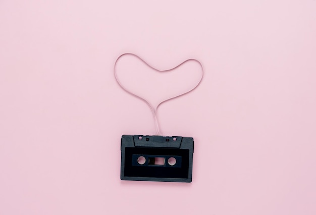 Close-up of heart shape on pink wall