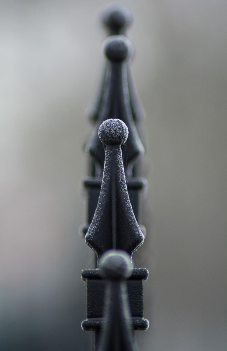 Fotografie close-up of metallic fence