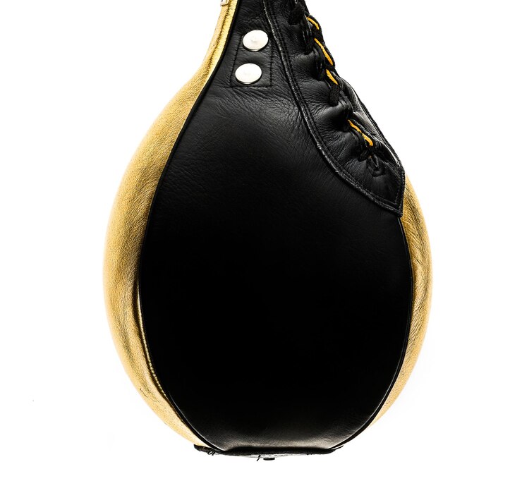 Fotografie close-up of punching bag over white background