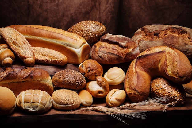 Close-up of various breads on table