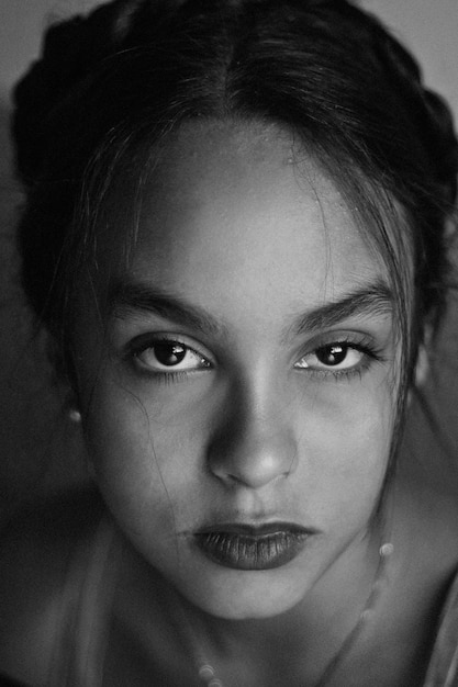 Close-up portrait of confident teenage girl