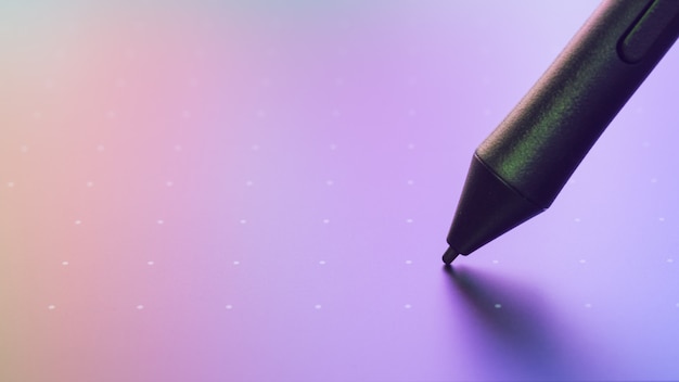 close up shot of graphic tablet with pen for illustrators and designers.