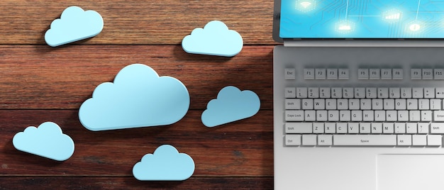 Cloud computing Počítač a modré mraky na dřevěném pozadí 3D ilustrace