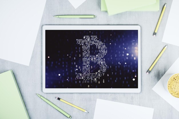 Creative Bitcoin concept on modern digital tablet screen Top view 3D Rendering