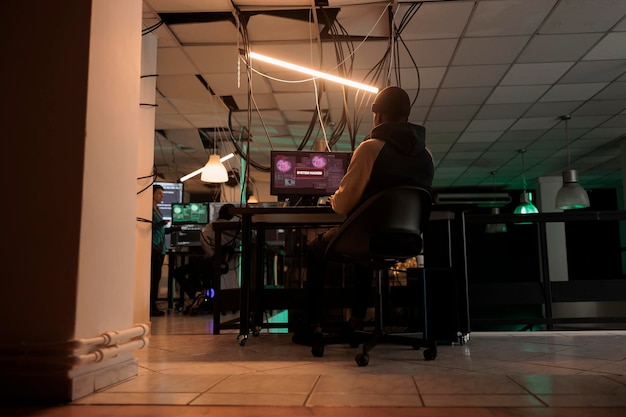 Dangerous hacker using spyware and accessing database