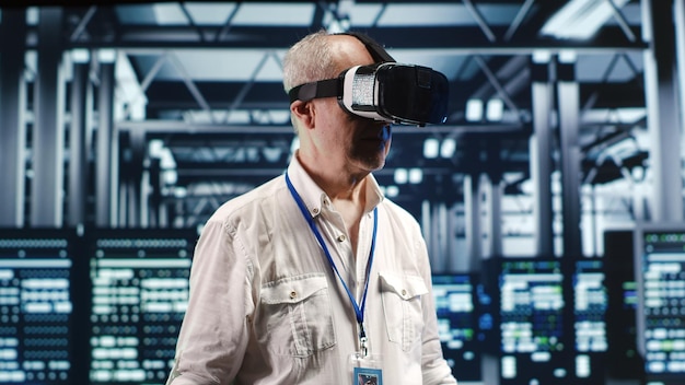 Developer with vr headset in data center