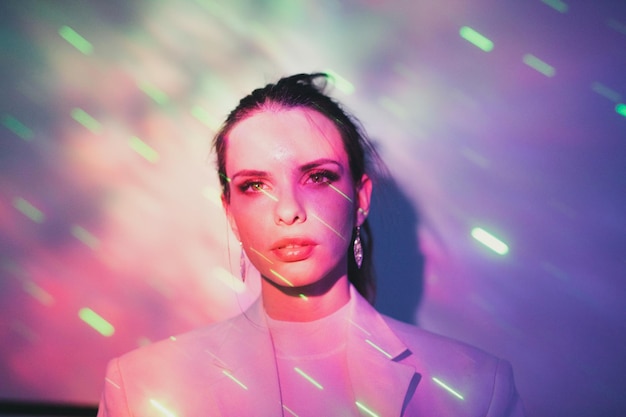 digital composite image of beautiful woman with illuminated lights