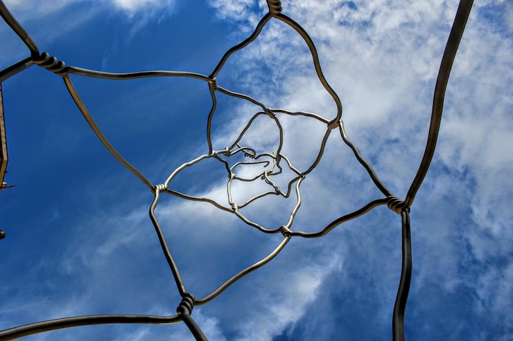 Fotografie directly below shot of metallic structure against blue sky