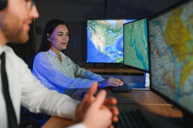 diverse call center operators team use computers consulting clients in office
