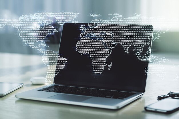 double exposure of abstract digital world map on laptop background research and strategy concept