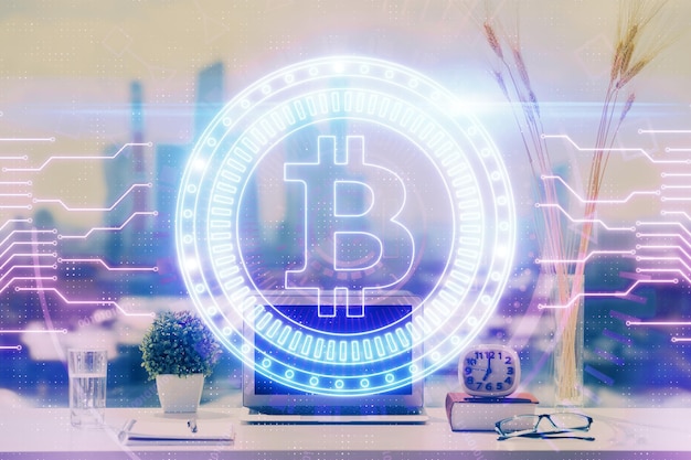 double exposure of blockchain and crypto economy theme hologram and table with computer background concept of bitcoin cryptocurrency