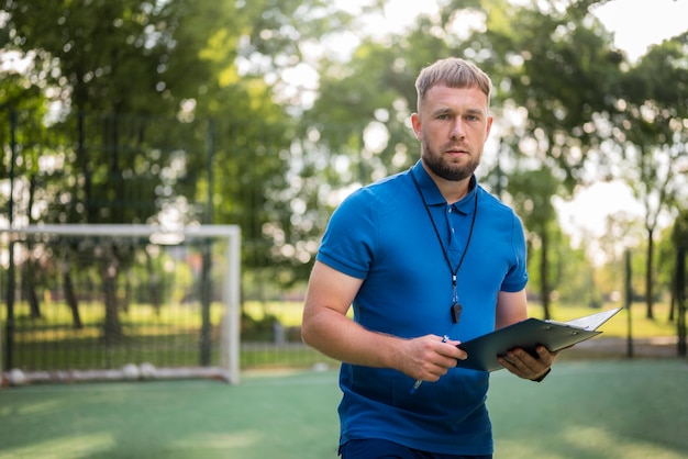 football trainer teaching his pupils