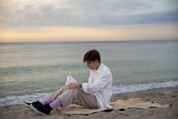 full shot contemplative man at the seaside
