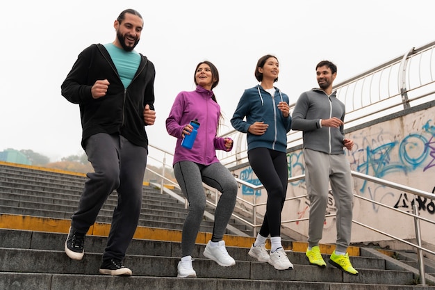 full shot latin people training outdoors