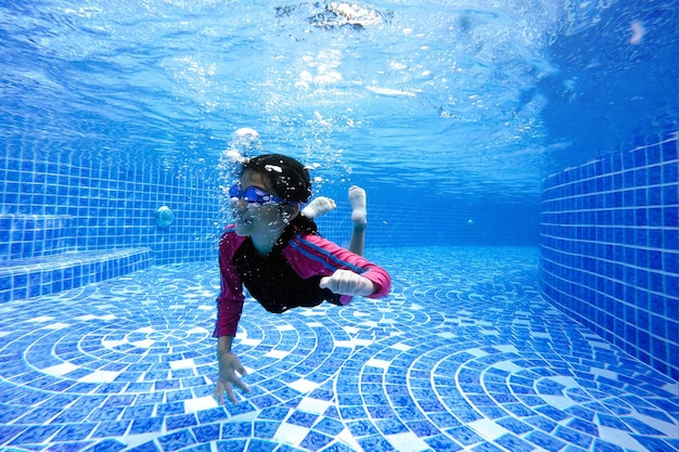 girl swimming in pool