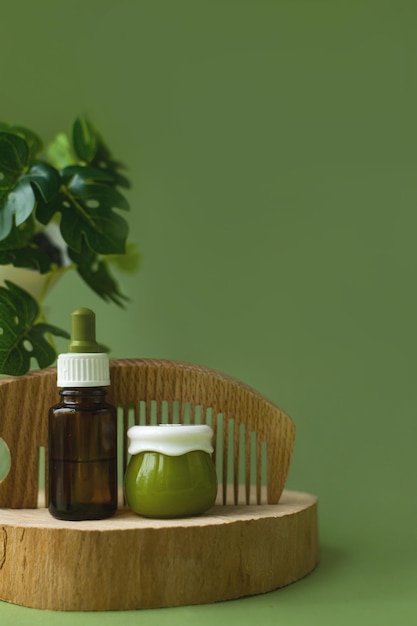 Glass cosmetic bottle with Vitamin and prebiotic serums Cosmetics in jar for care of hair