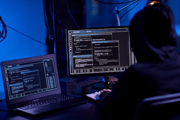 hacker using computer virus for cyber attack